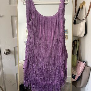 Pretty Tina solid color rocking tassel backless mini dress